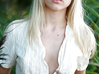 Nice young blonde LEYA A posing outdoor