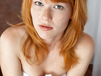 Sexy young redhead model MIA SOLLIS with freckles