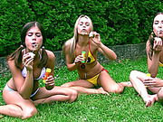 three schoolgirls play undressed