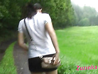 Zuzinka plays with her muff outdoor