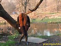 An urgent pissing in the unfathomable of the park