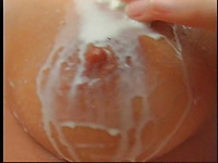 Teeb babe covered her body with white liquid for easier masturbation