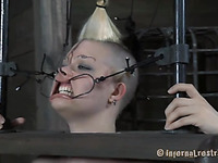 Hard punishment to bald head slut in cage